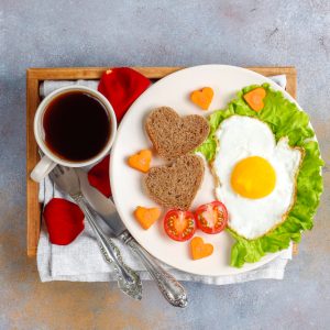 breakfast-valentine-s-day-fried-eggs-bread-shape-heart-fresh-vegetables